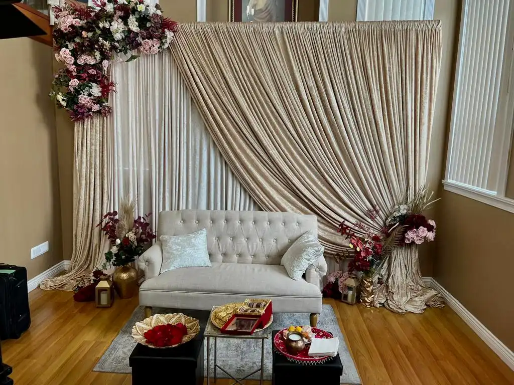 Champagne and burgundy home ceremony décor · Dream Decorators