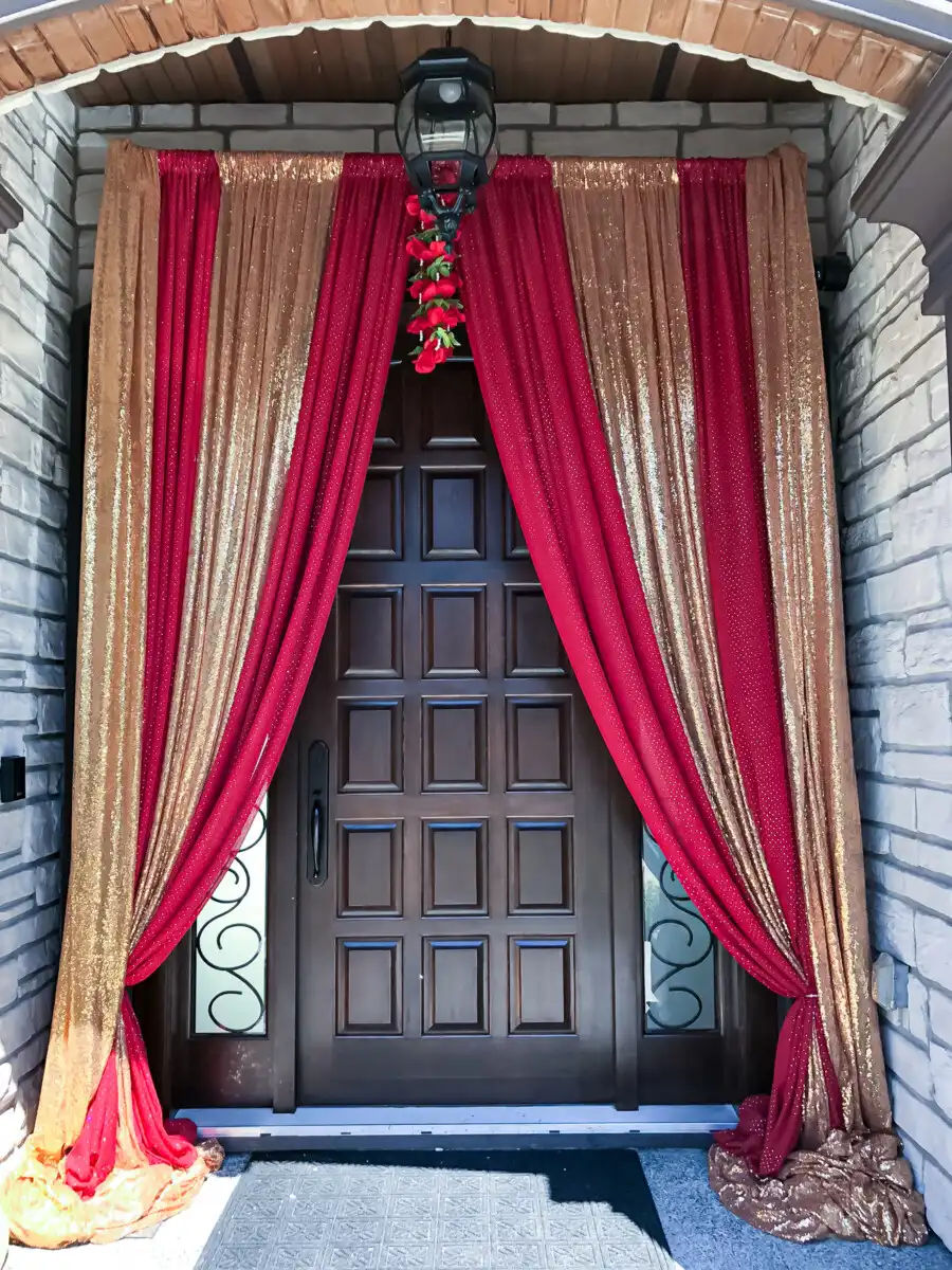 Red and gold sequined home door entrance · Dream Decorators Surrey