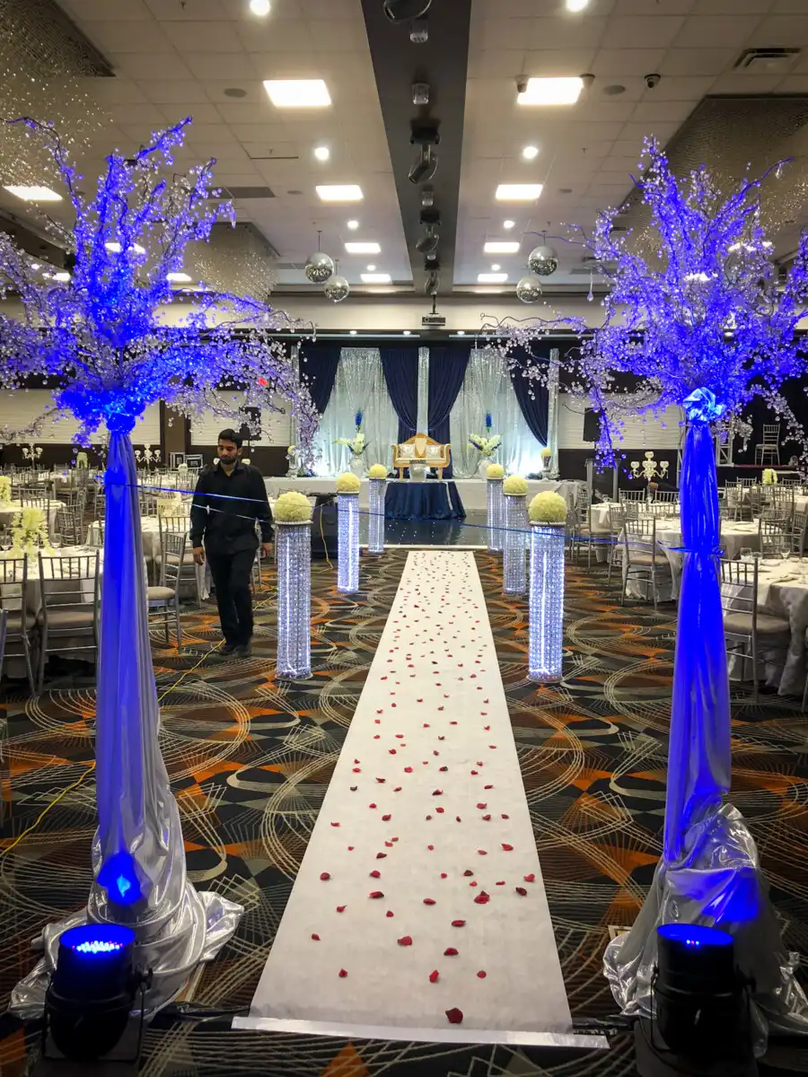 Blue crystal tree reception aisle décor · Dream Decorators