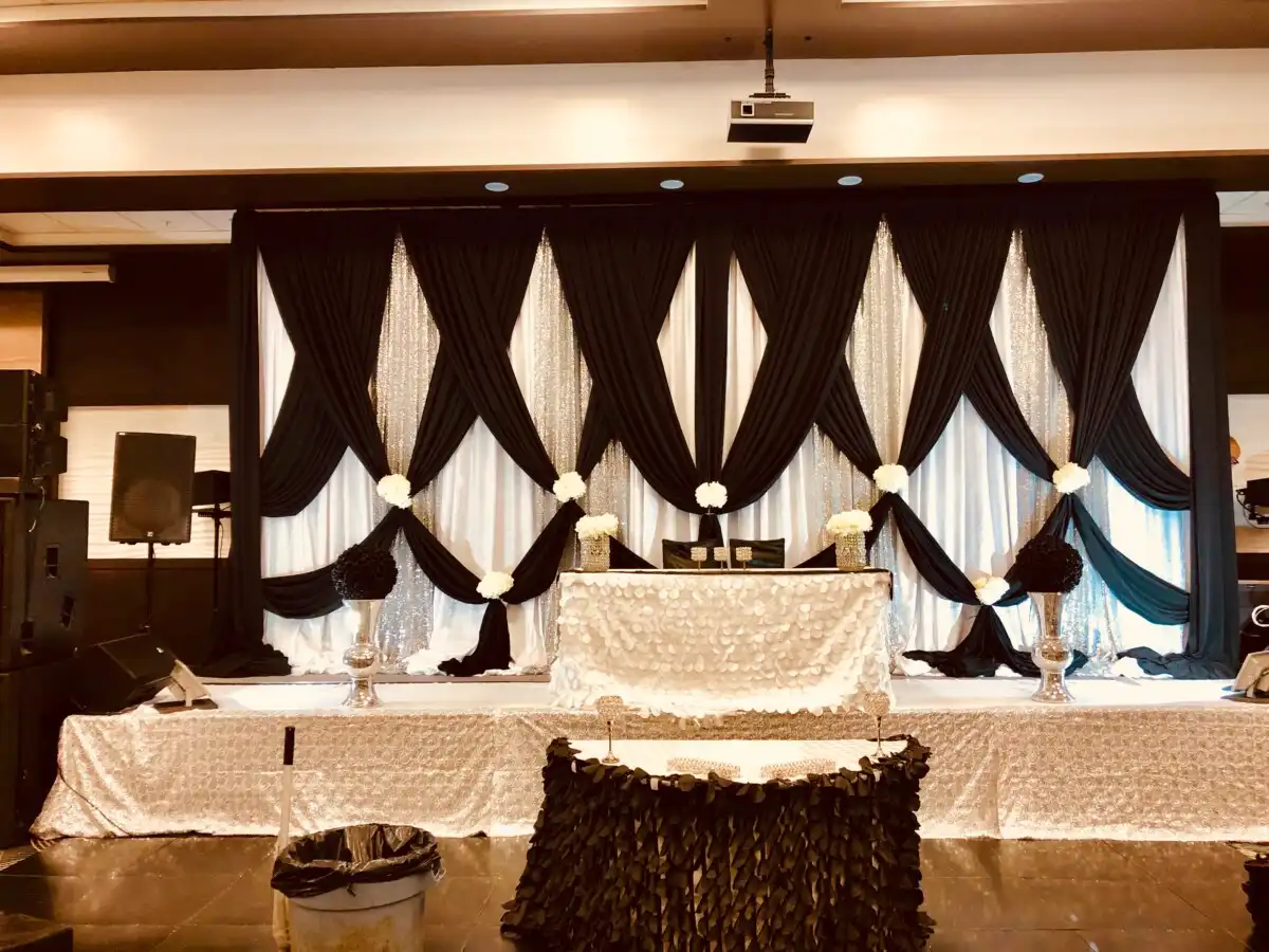Monochrome black and white reception stage décor · Dream Decorators