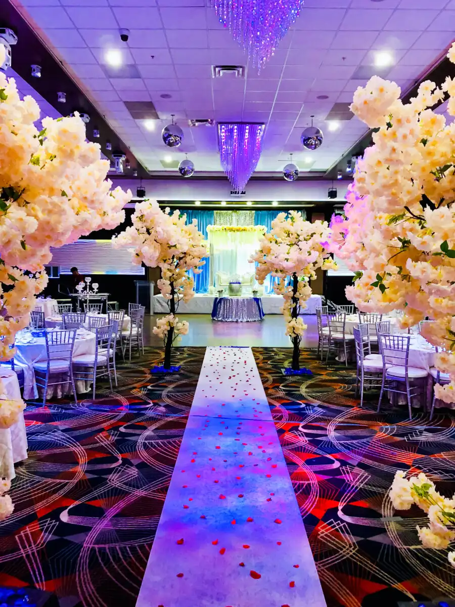 Cherry blossom reception walkway with uplighting · Dream Decorators Surrey