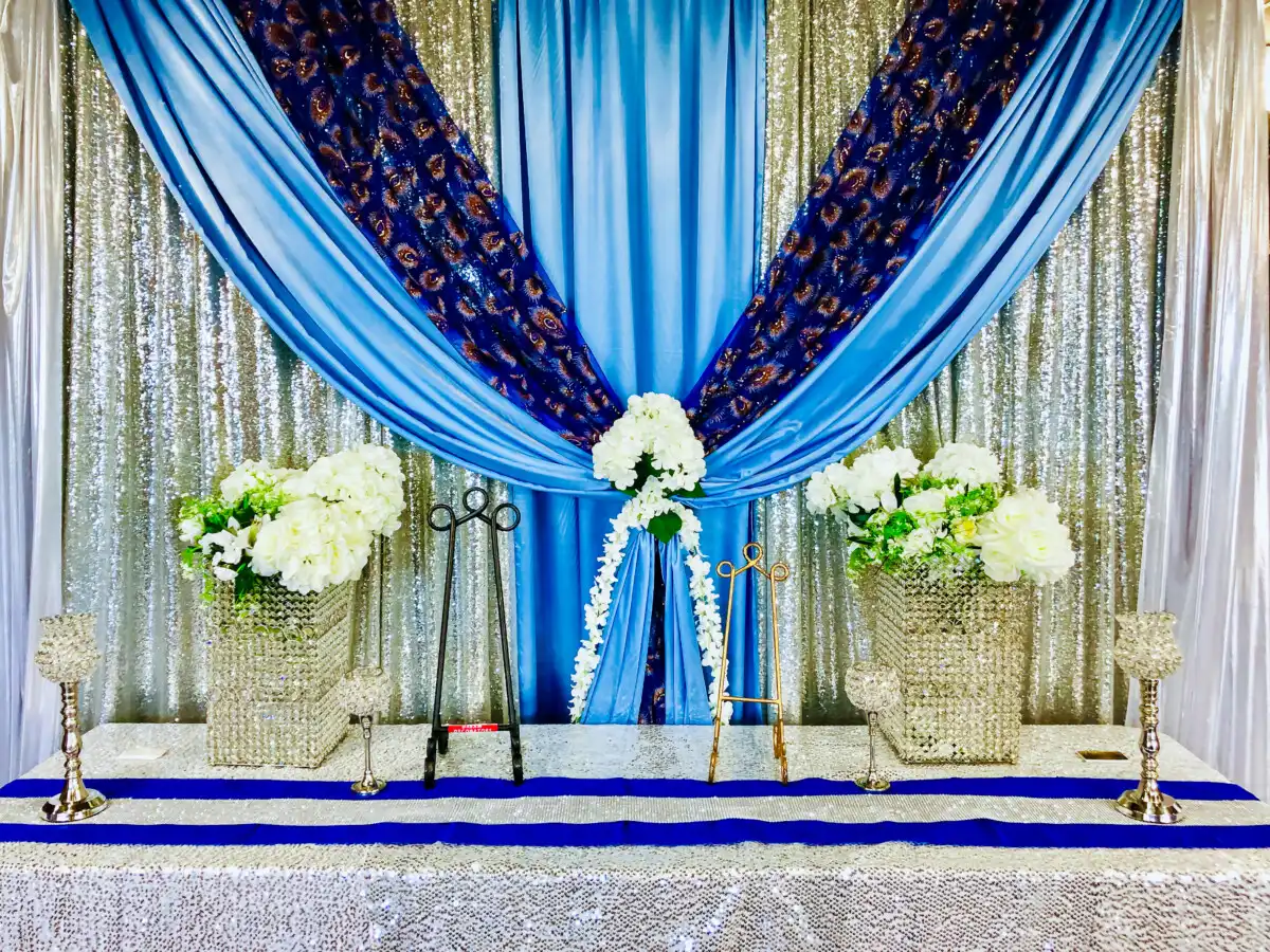 Peacock royal blue and silver wedding stage décor · Dream Decorators