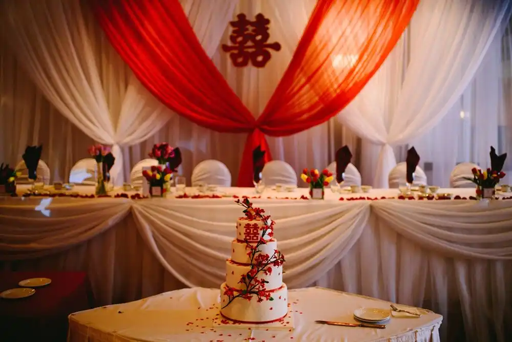 Red and white reception with Double Happiness décor · Dream Decorators