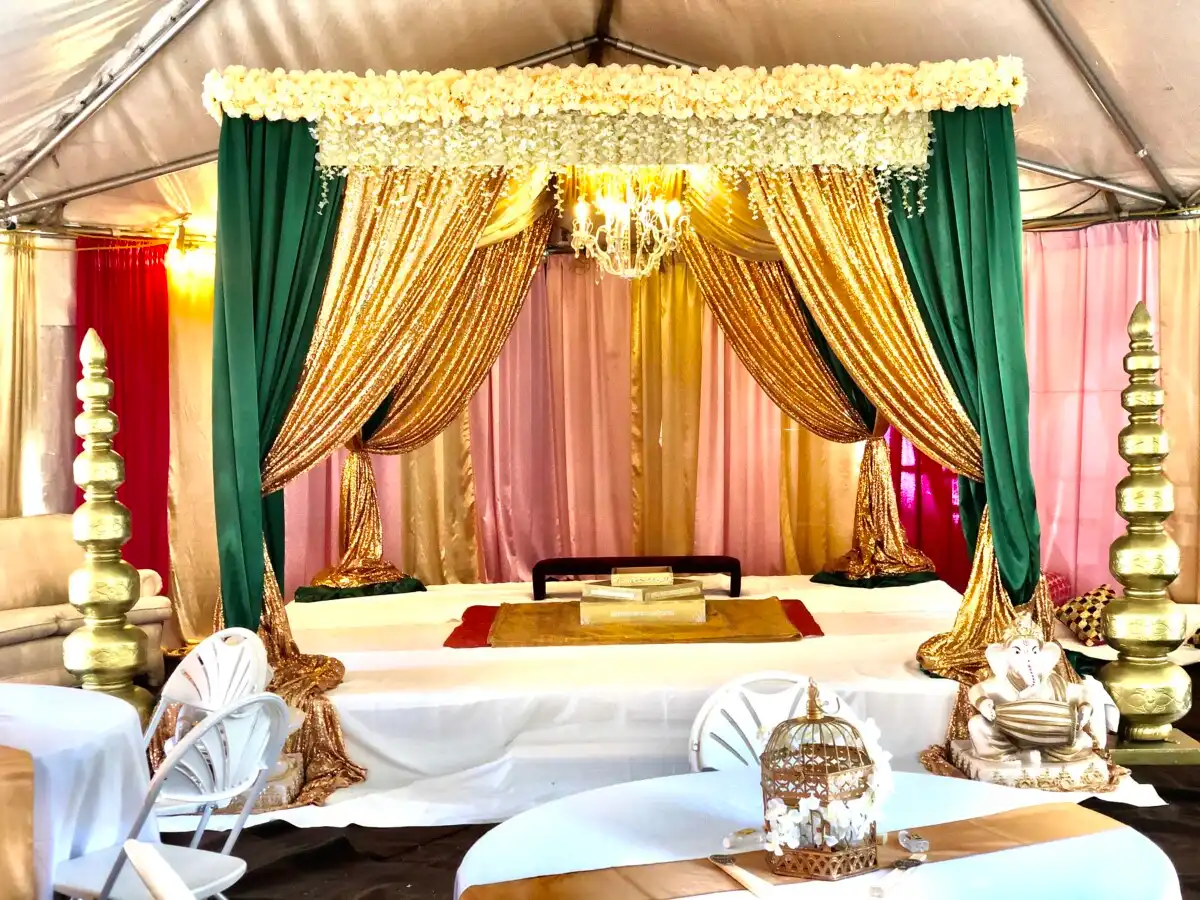 Emerald and gold tent mandap with Ganesha statue · Dream Decorators