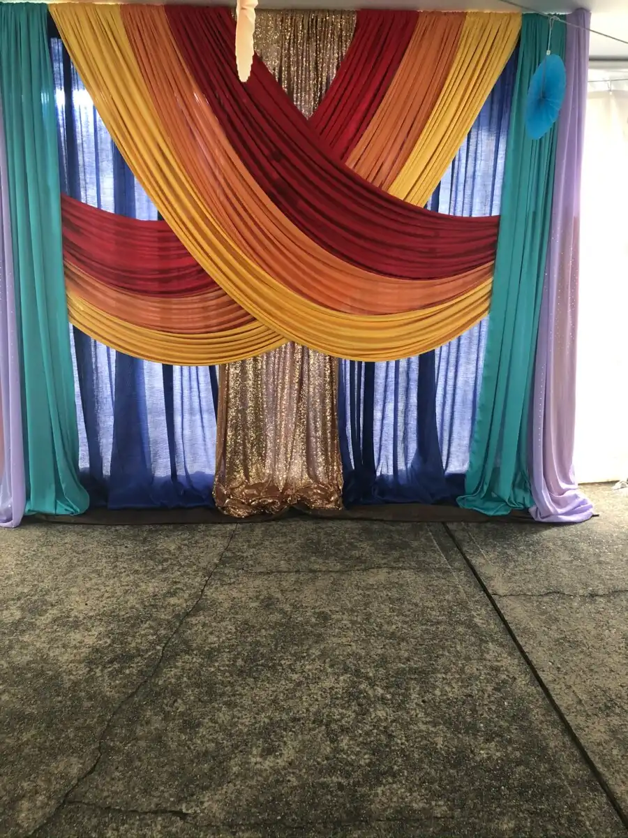 Multicolour criss-cross mehndi fabric backdrop · Dream Decorators
