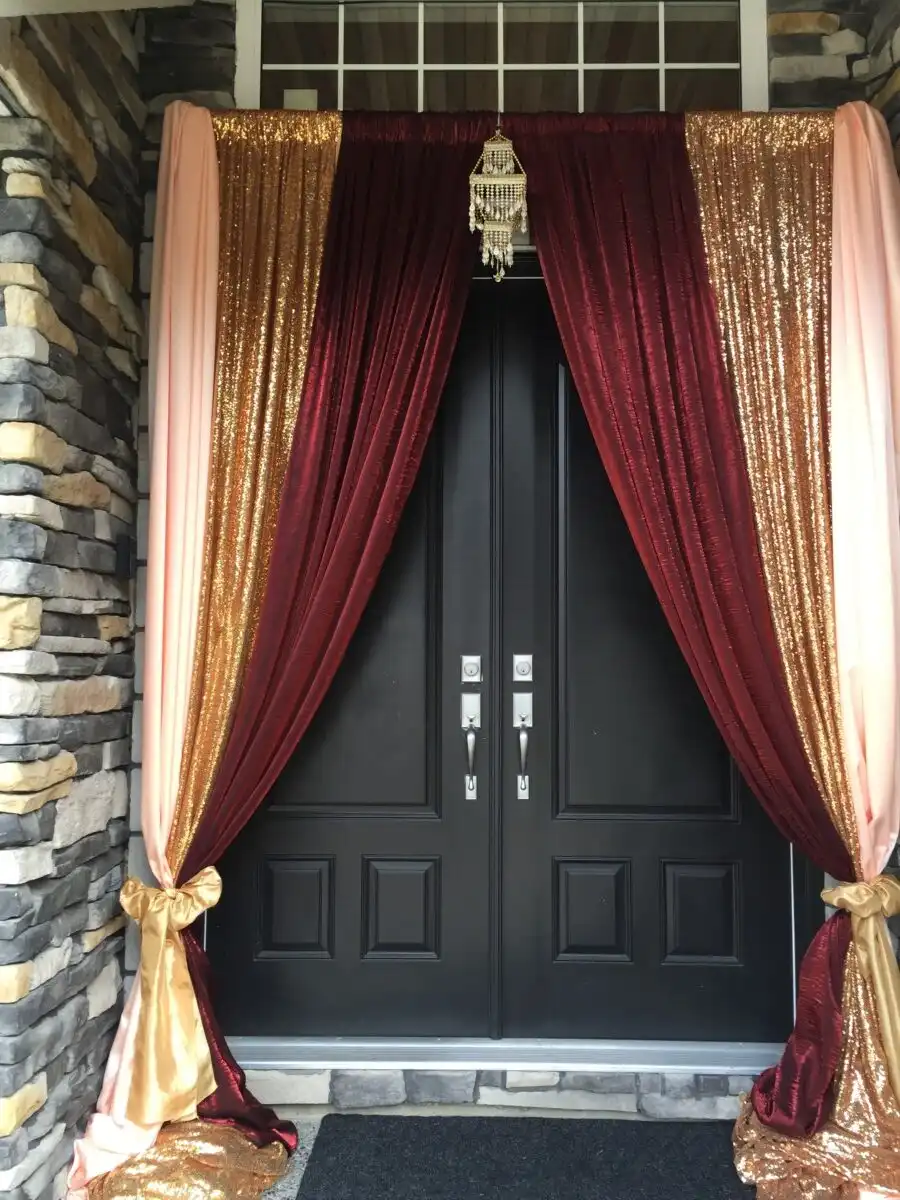Burgundy and gold home entrance draping · Dream Decorators Surrey