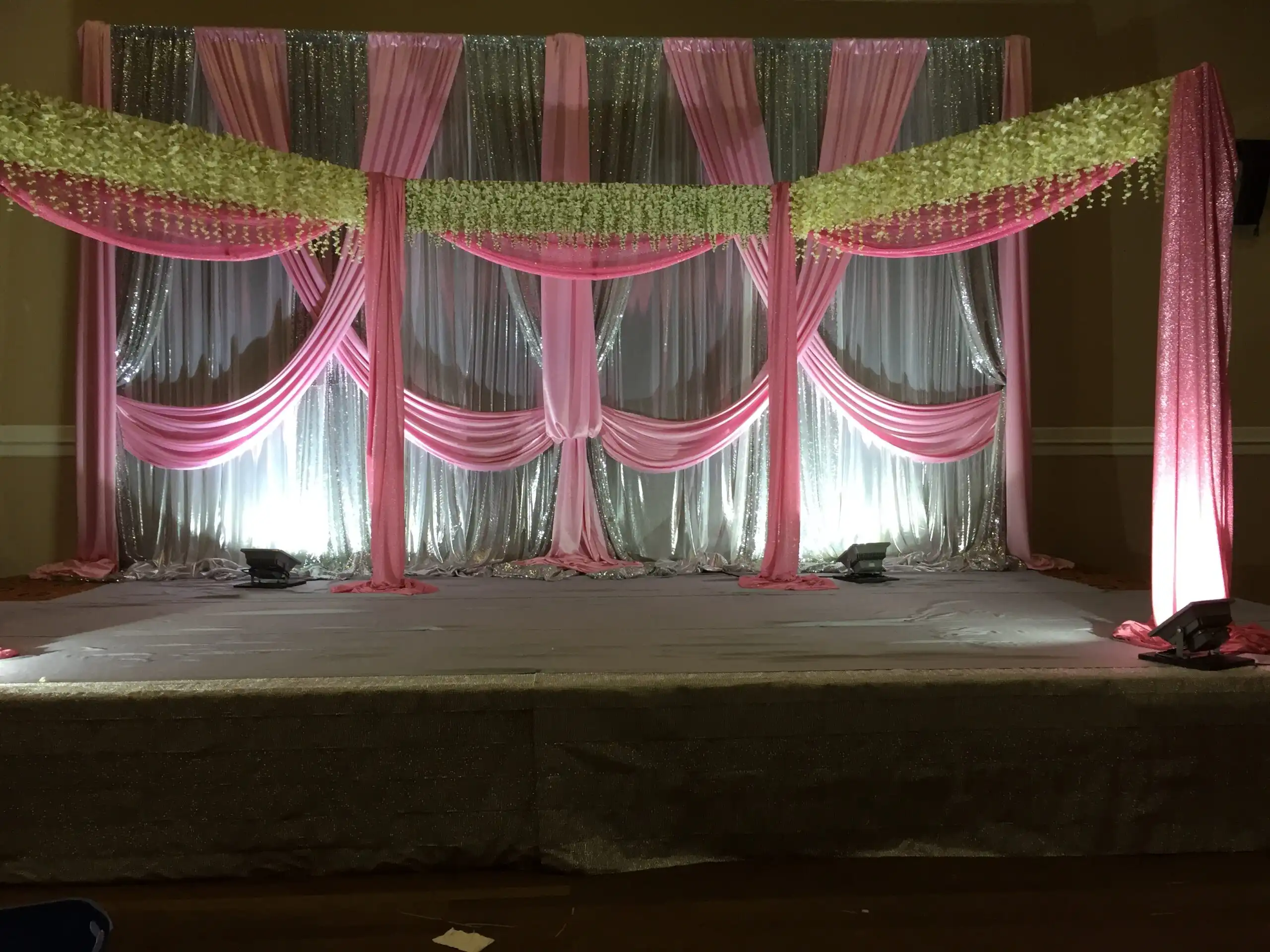 Silver sequin and pink swag reception backdrop · Dream Decorators