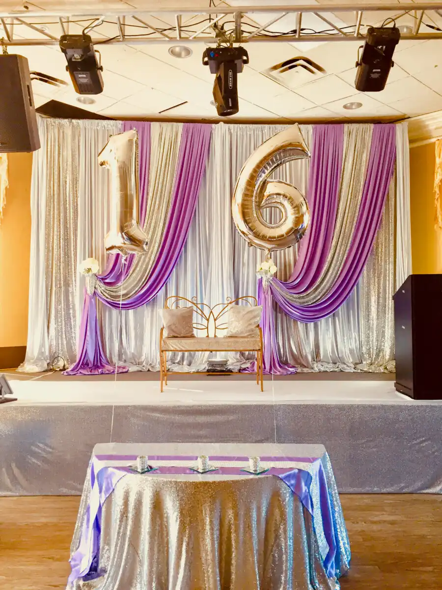 Purple and silver Sweet 16 stage · Dream Decorators