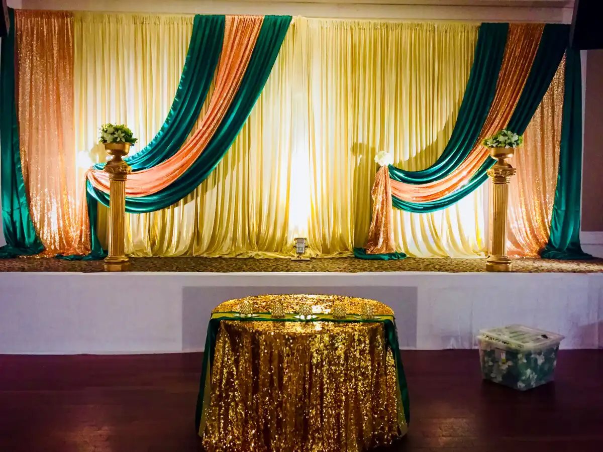 Gold teal and peach stage with pedestals · Dream Decorators