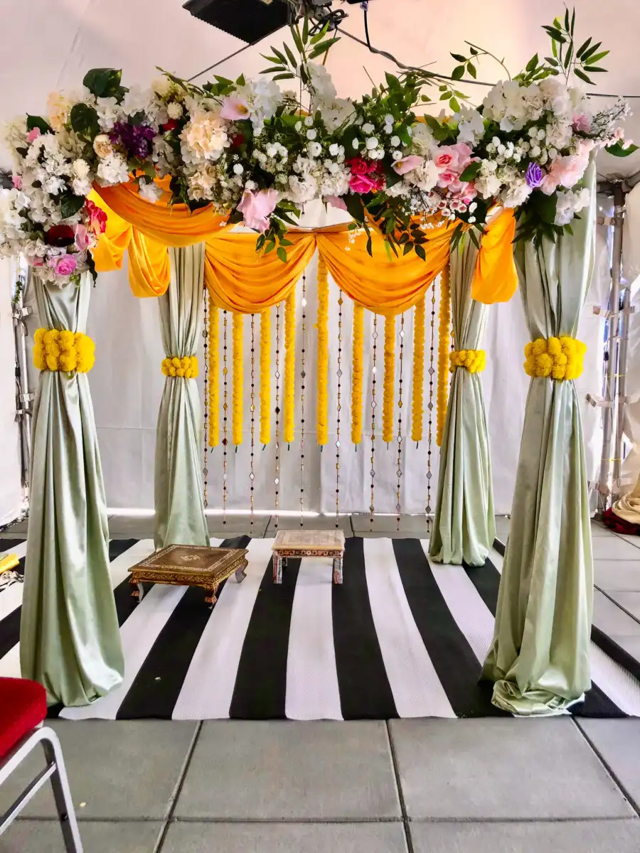 Yellow and mint green haldi canopy · Dream Decorators